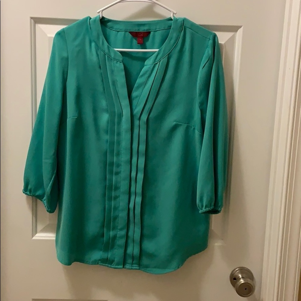 Green and white blouses